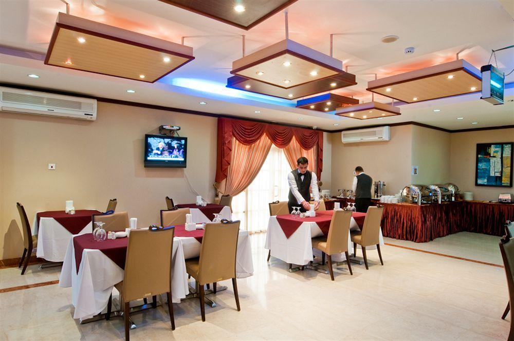 La Villa Palace Hotel Doha Restaurant bilde